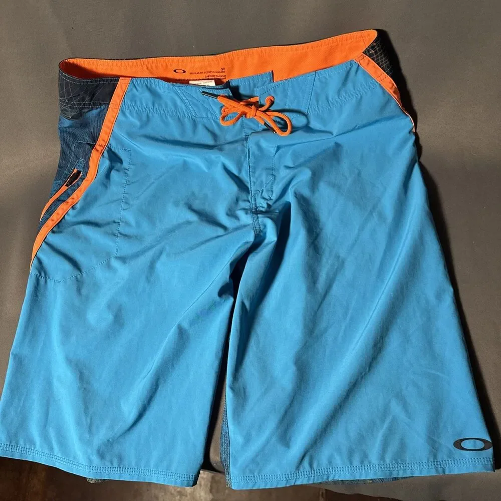 Oakley 32 Blue Board Shorts Zip Pocket Orange Regular Fit Swim Skull Y2K Print